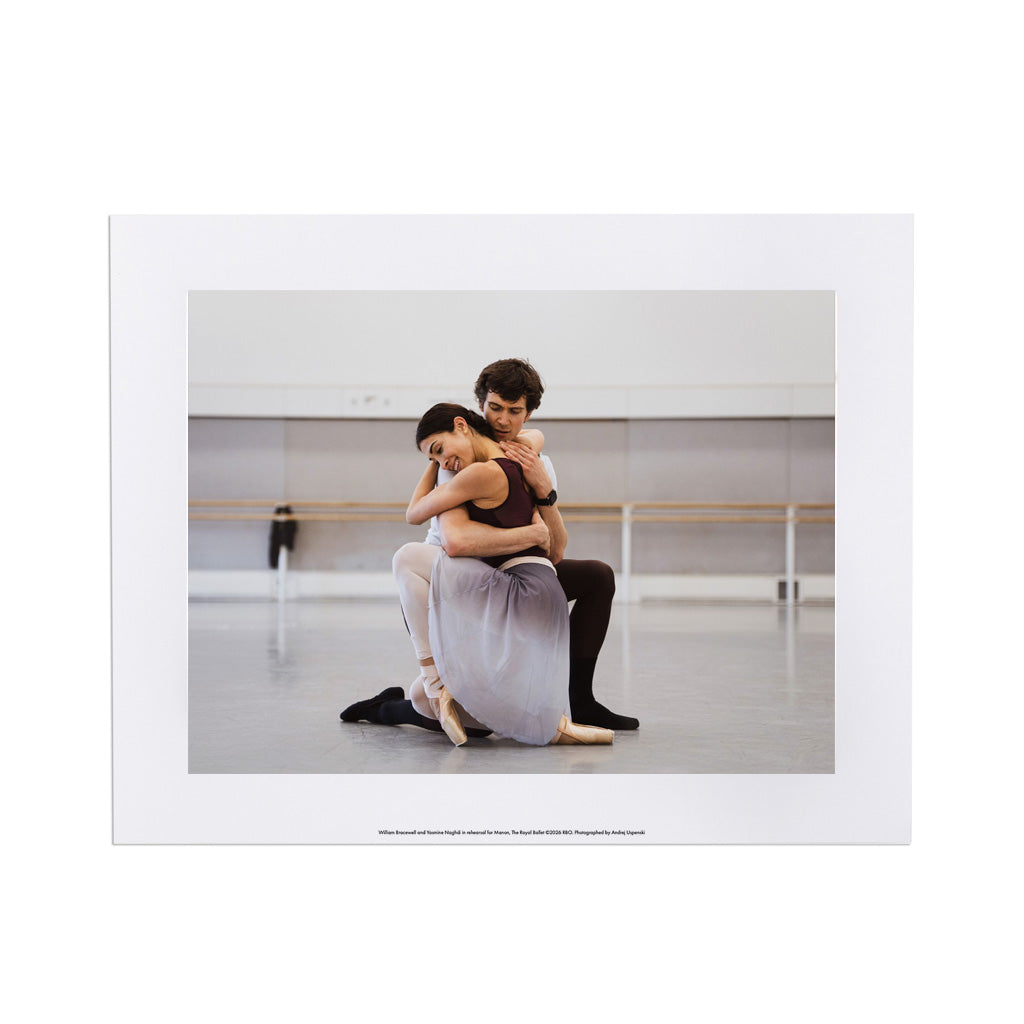 an image of dancers in rehearsal for the ballet Manon with a white boarder on a white background