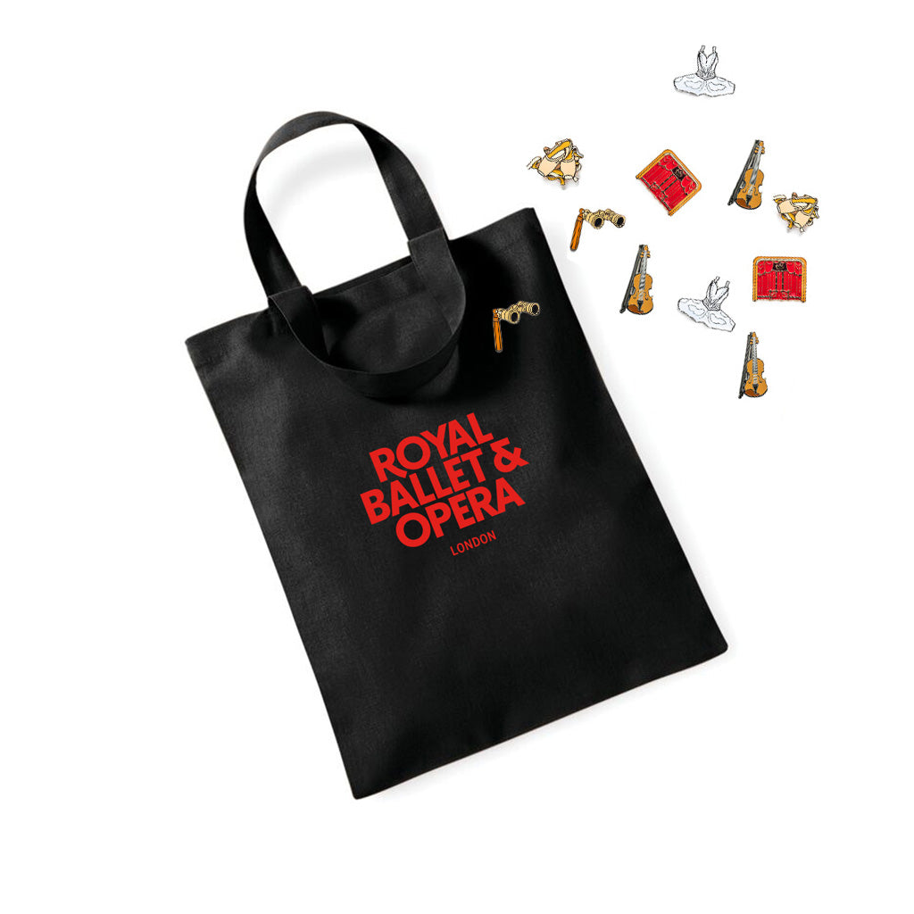 opera glasses pin badge on a small RBO tote