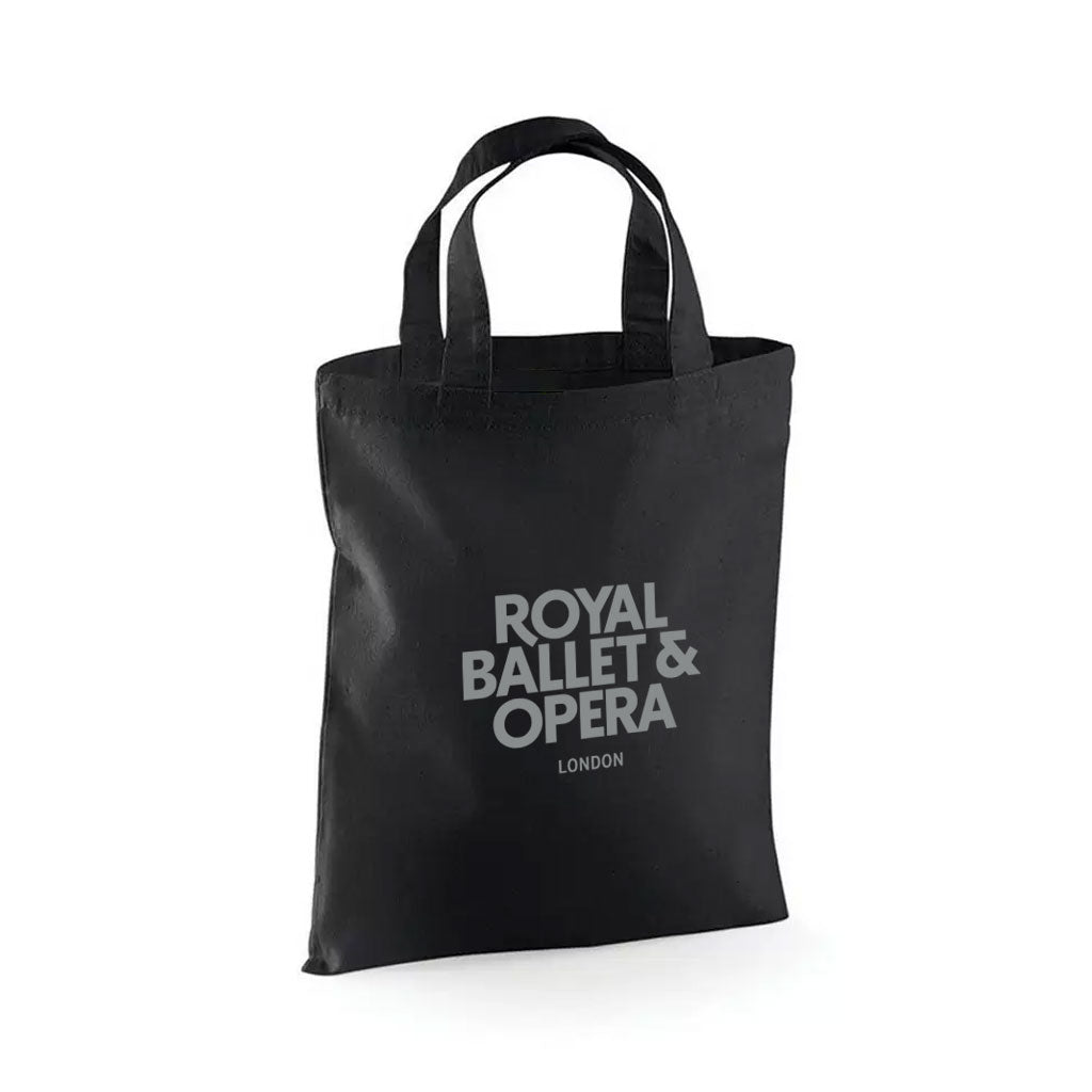 Mini black tote bag with 'Royal Ballet &amp; Opera London' silver text on a white background