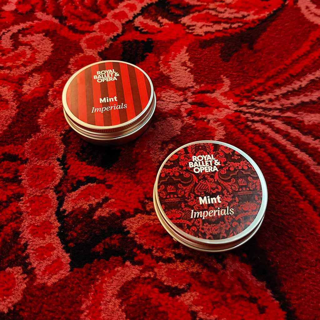 Tin of 'Royal Ballet & Opera' Mint Imperials with a design featuring the iconic RBO carpet on a white background