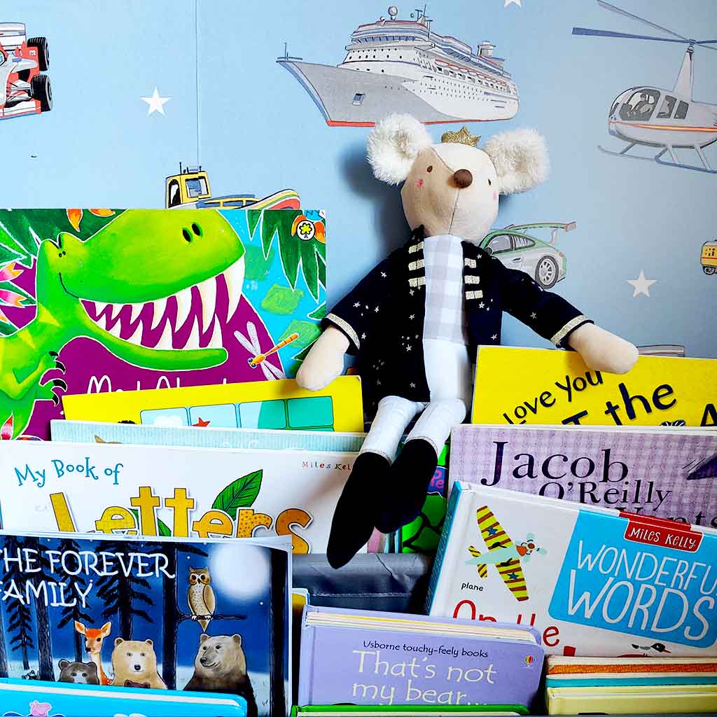 Mouse King Doll on book shelf