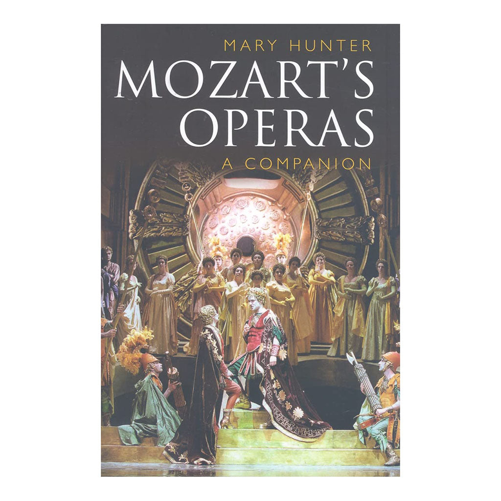 Mozart's Operas A Companion by Mary Hinter with photo from an opera onstage on the front cover
