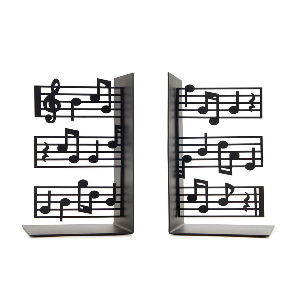 Metal bookends with music note designs on a white background