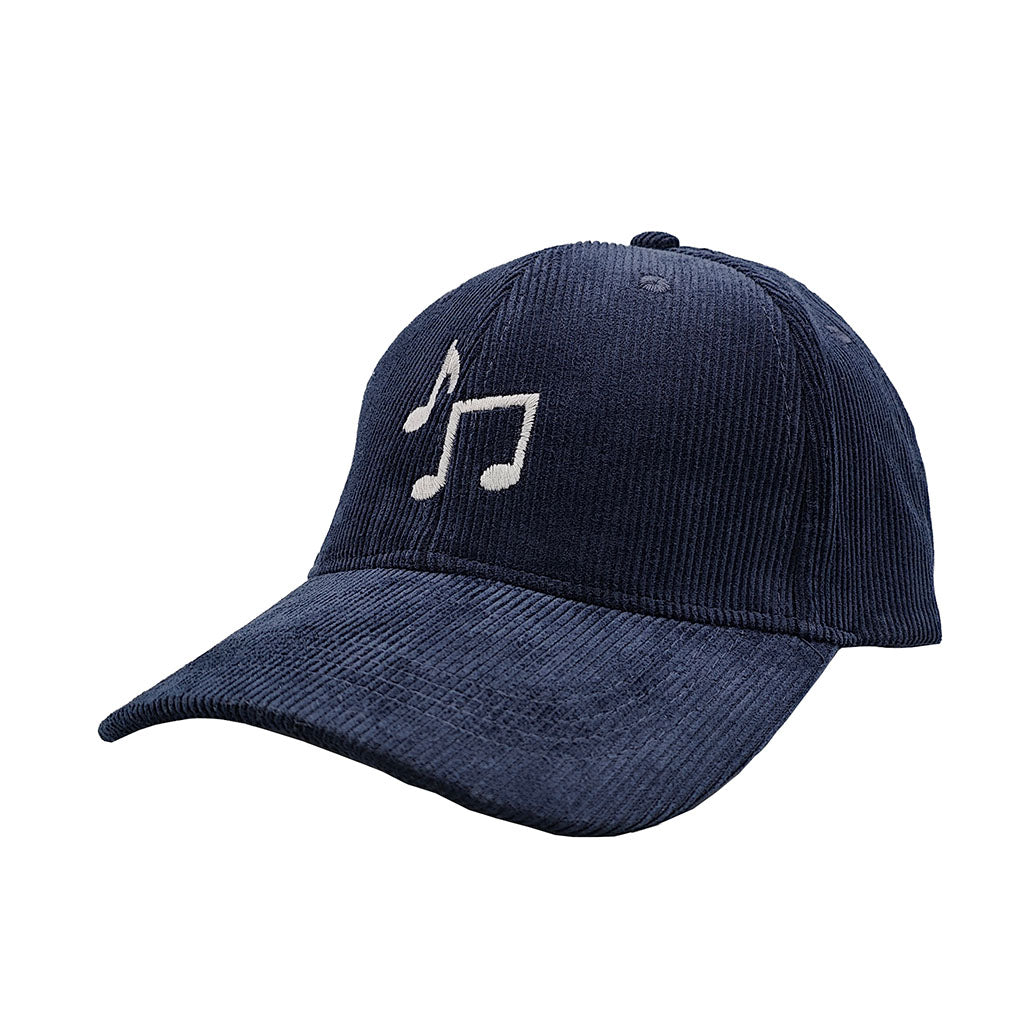 Navy cord cap with a embroidered music notes in grey on a white background