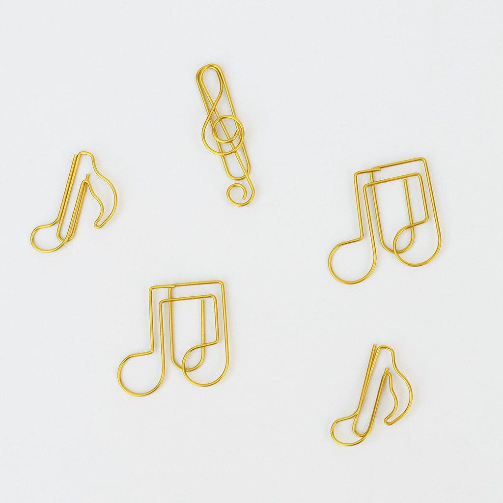 Pack of 5 music paper clips with green packaging on a white background