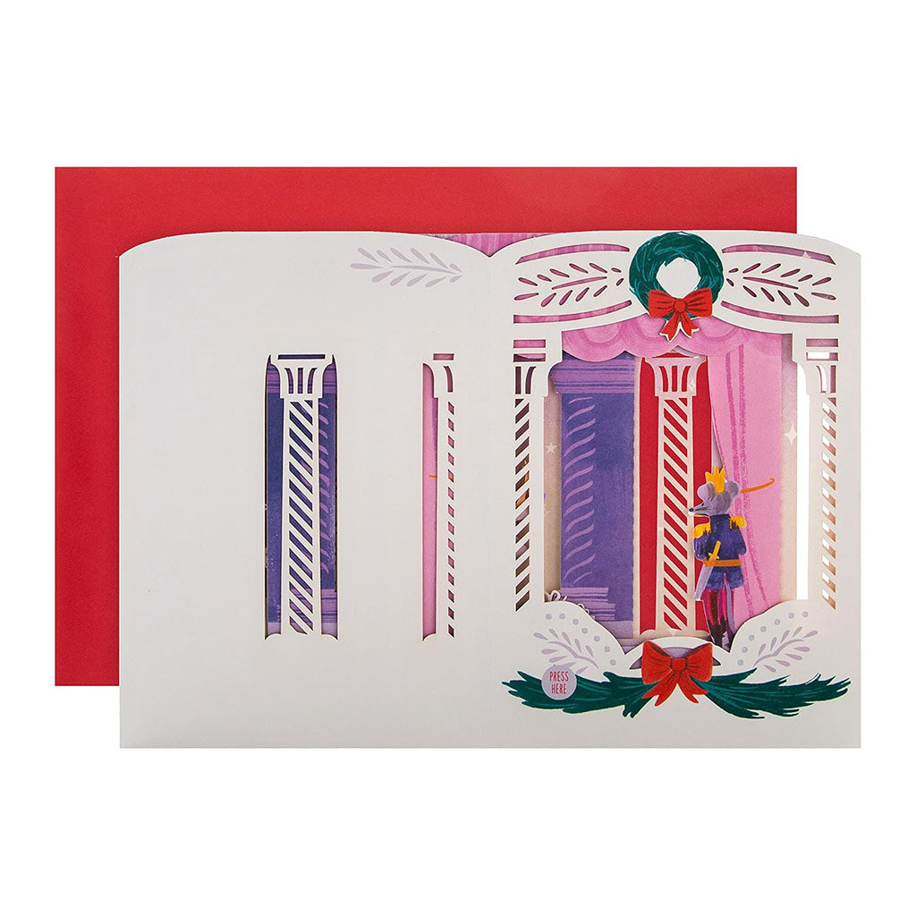 Layed flat Nutcracker card with a stage scene of the ballet on a white background