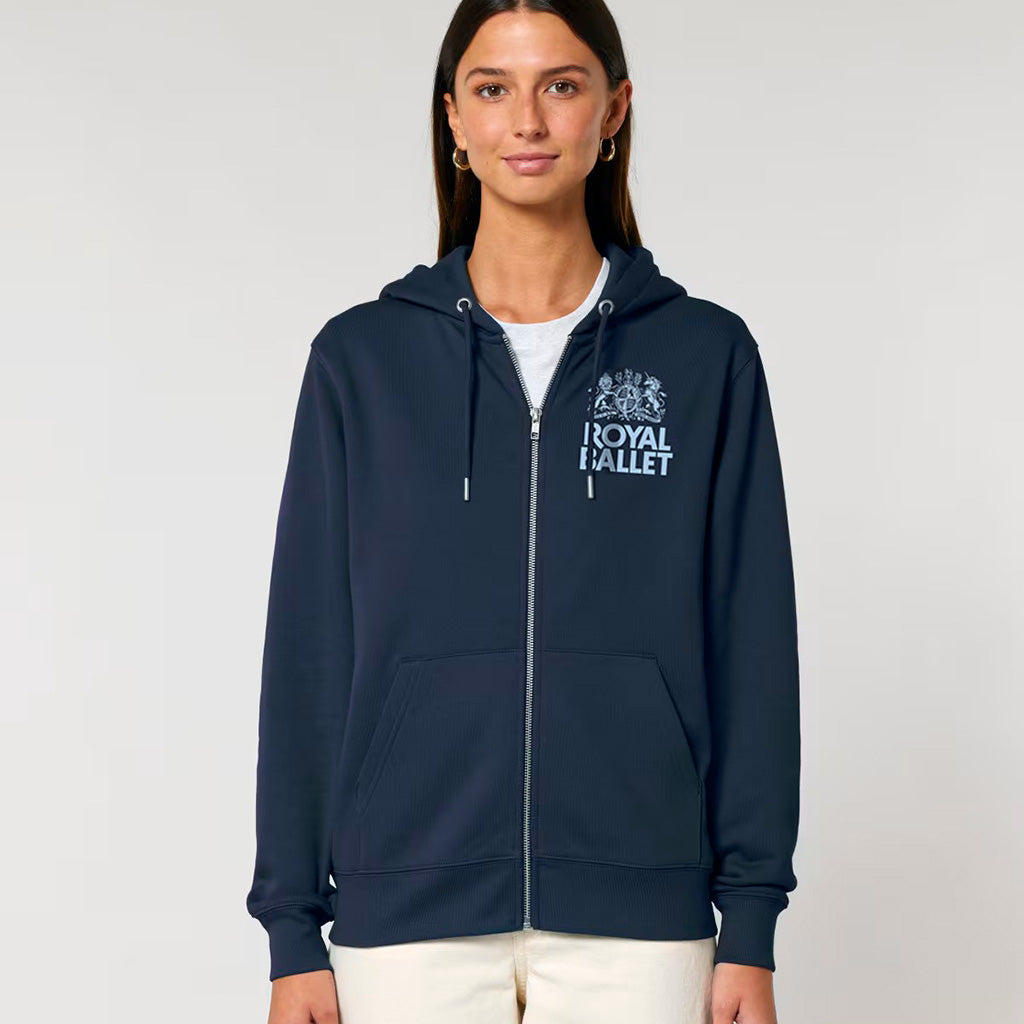 Person wearing a navy blue hoodie with 'Royal Ballet' logo on a light gray background