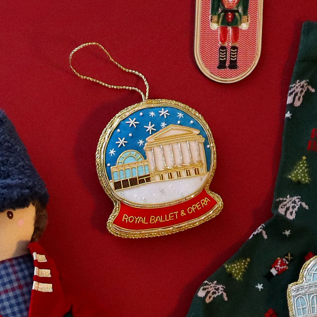 RBO decoration with the building design and 'Royal Ballet & Opera' text on a red background.