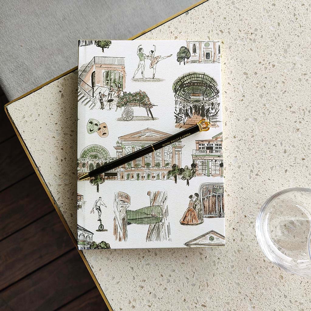 Covent Garden Hardback Notebook on a marble table with crown pen