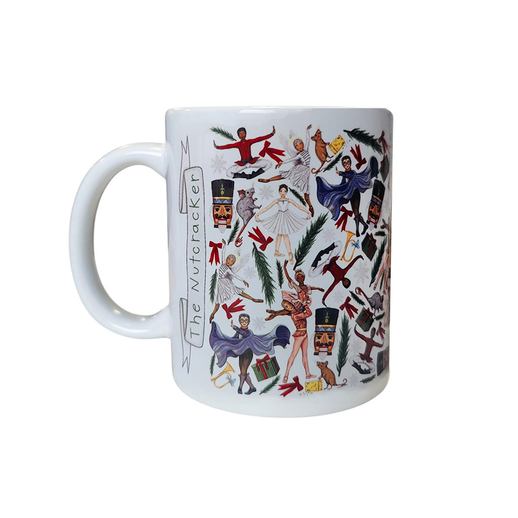 White mug with colourful illustrations of characters from &#39;The Nutcracker&#39; on a white background