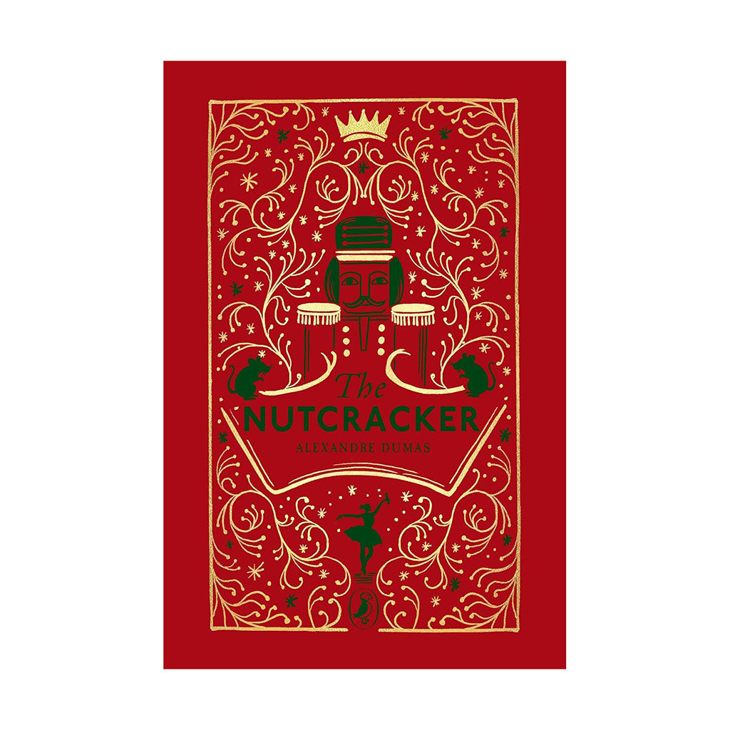Decorative book cover of &#39;The Nutcracker&#39; with red and gold design on a white background