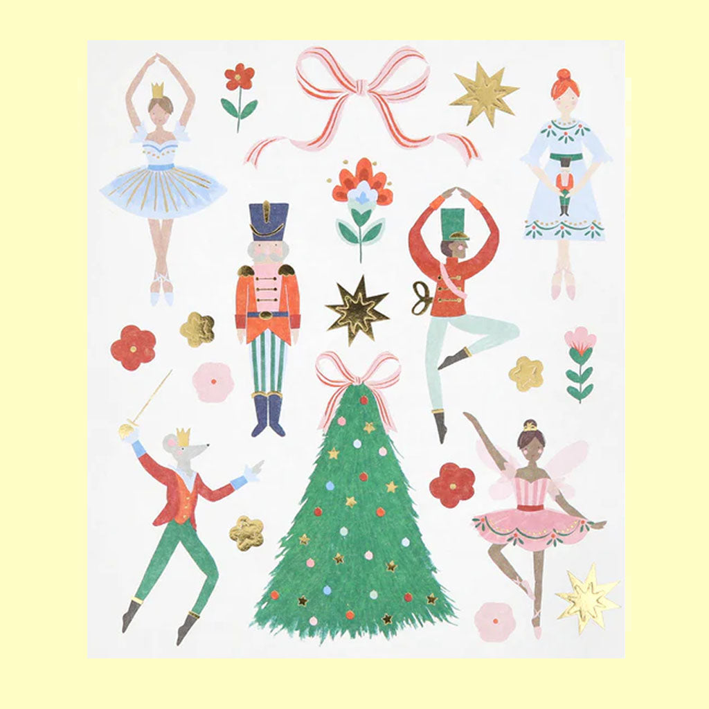 Packaging of Nutcracker Ballet stickers with illustrations of dancers, a tree, and flowers on a white background.