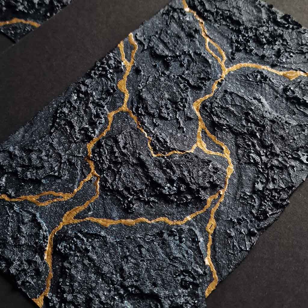 Mounted black and gold artwork inspired by Orlando by Virginia Woolf on a white back ground