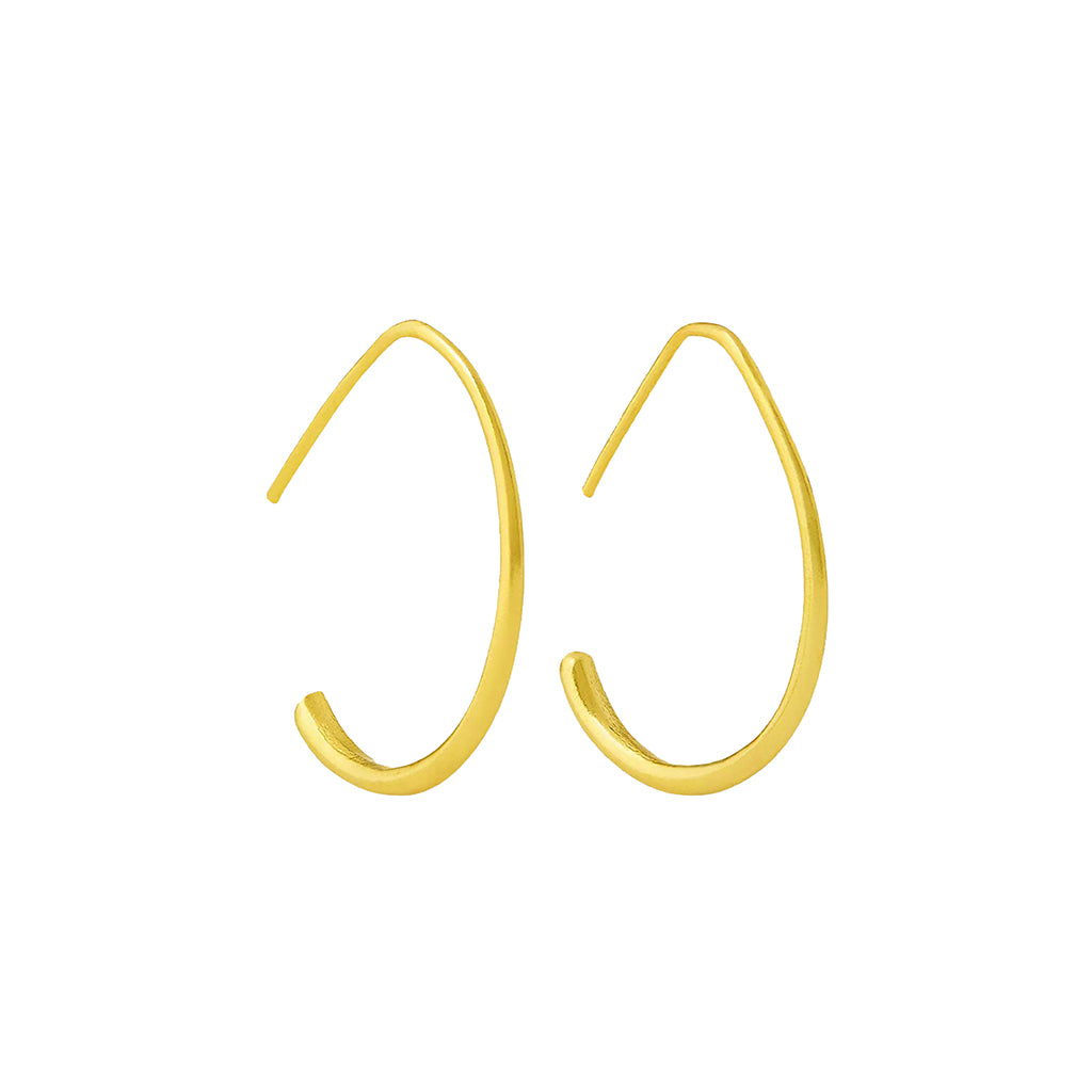 Gold plated brass small oval hoop earrings on a white background