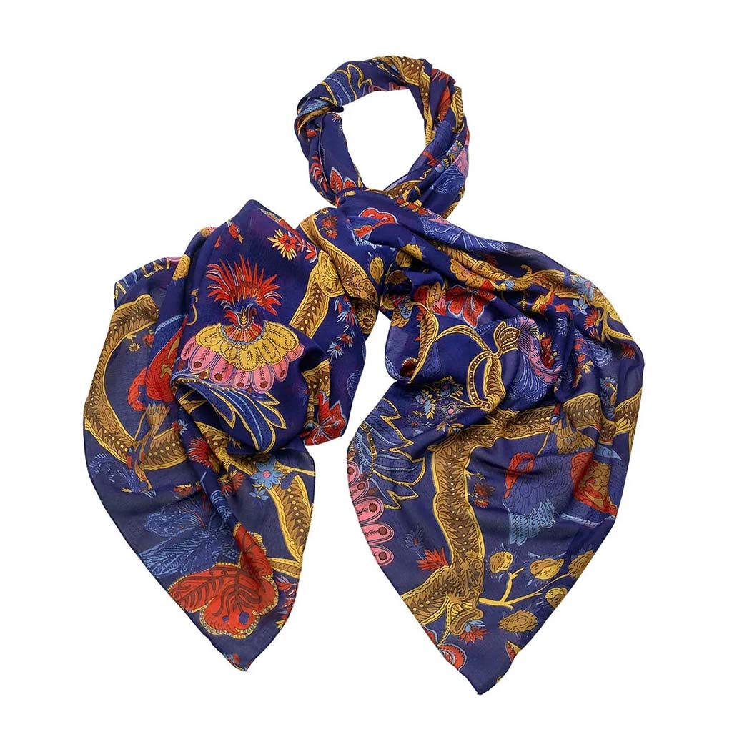 Blue and gold peacock patterned scarf on a white background