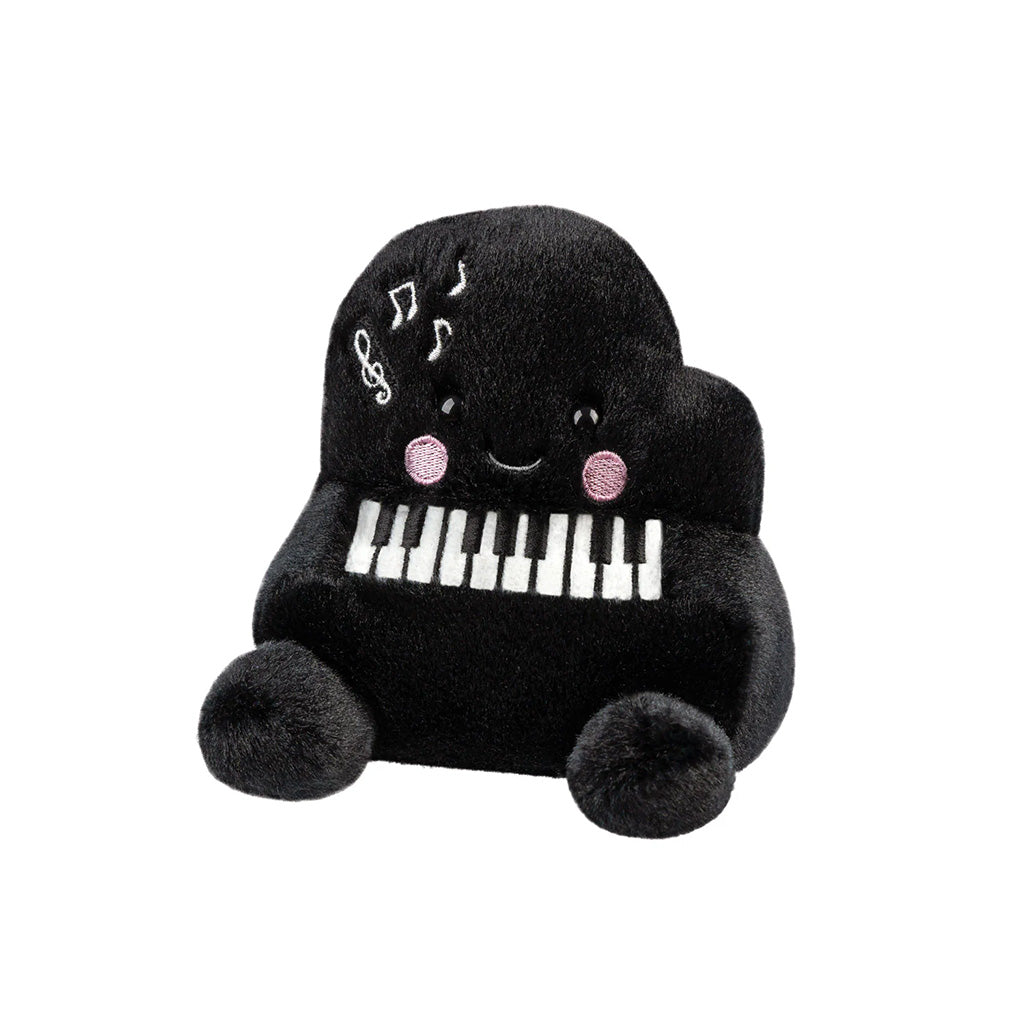 black piano shaped soft plush top on a white background