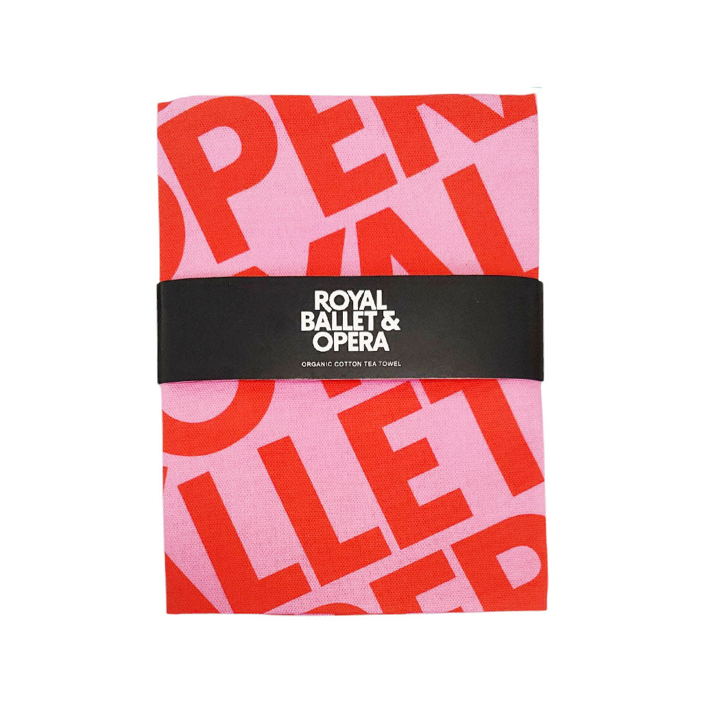 Pink and red RBO patterned towel with &#39;Royal Ballet &amp; Opera&#39; branding on a white background