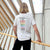 Model in Pride T-Shirt 2025 on the bridge of aspiration
