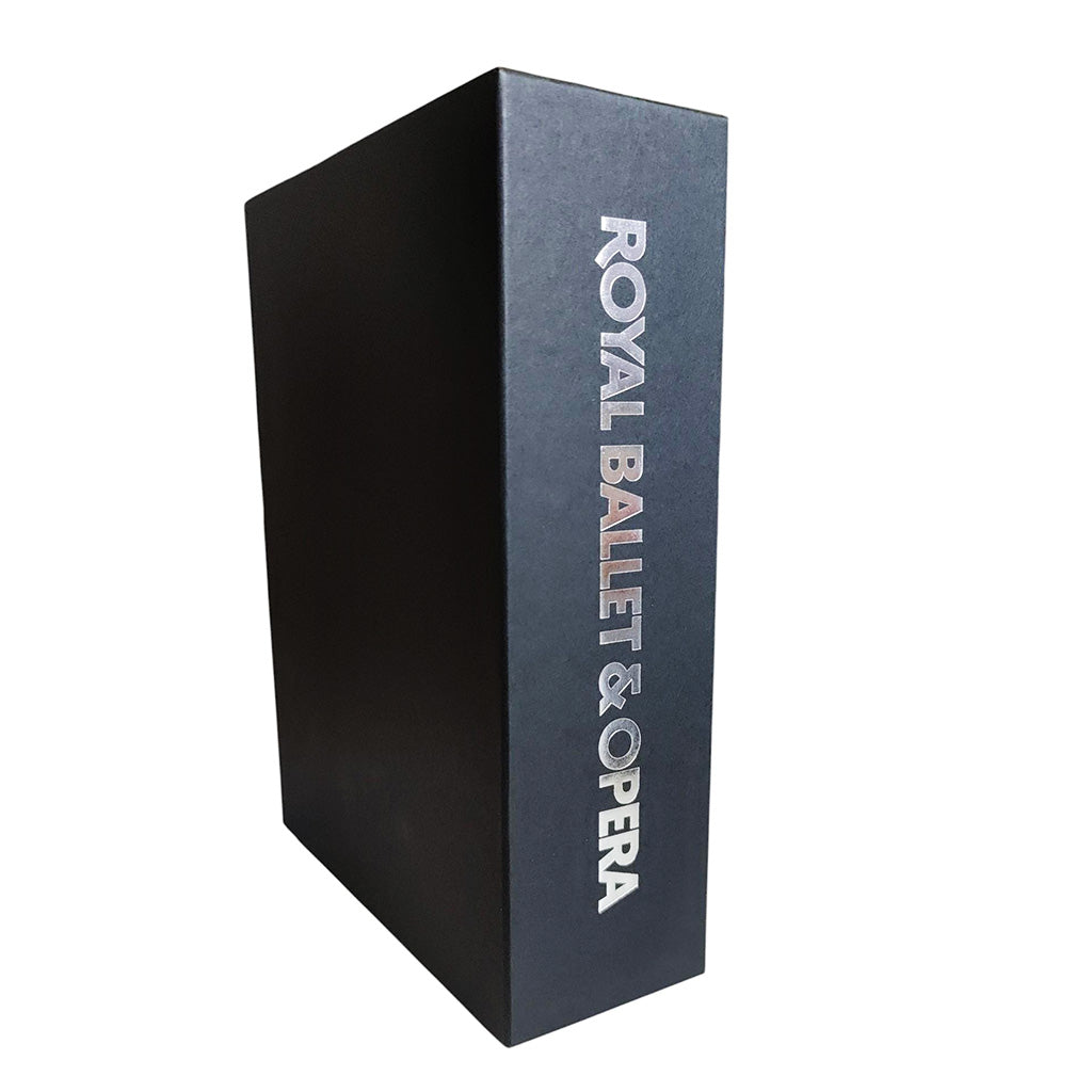 Black programme holder with silver 'Royal Ballet &amp; Opera' text on a white background