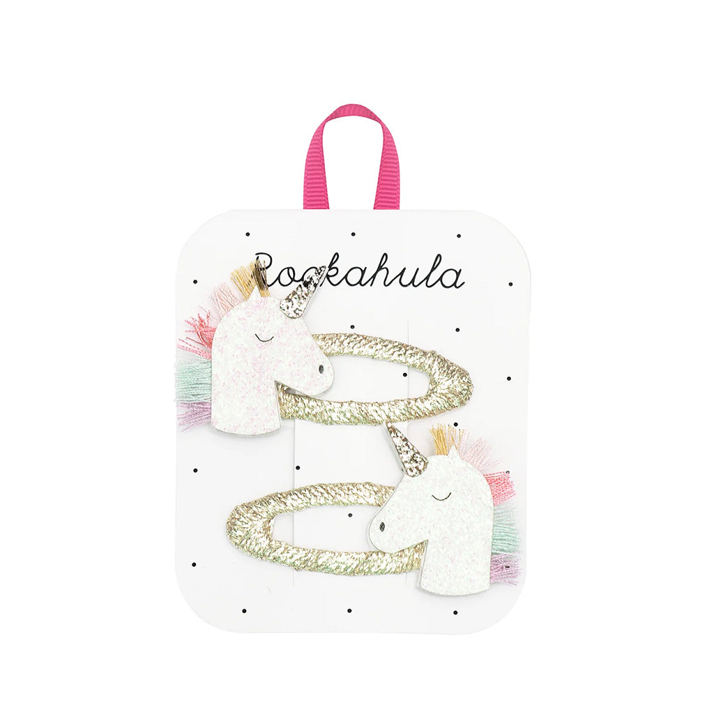 Unicorn-themed hair clips with 'Rockahula' branding on a white background