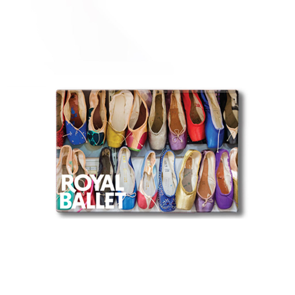 A rectangular magnet featuring a colourful ballet pointe shoes, with the words 'ROYAL BALLET' in large white  text across the lower left. The print is shown against a plain white background with a soft drop shadow.