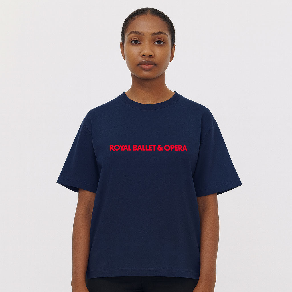 Person wearing a navy blue t-shirt with &#39;ROYAL BALLET &amp; OPERA&#39; text in red on a white background