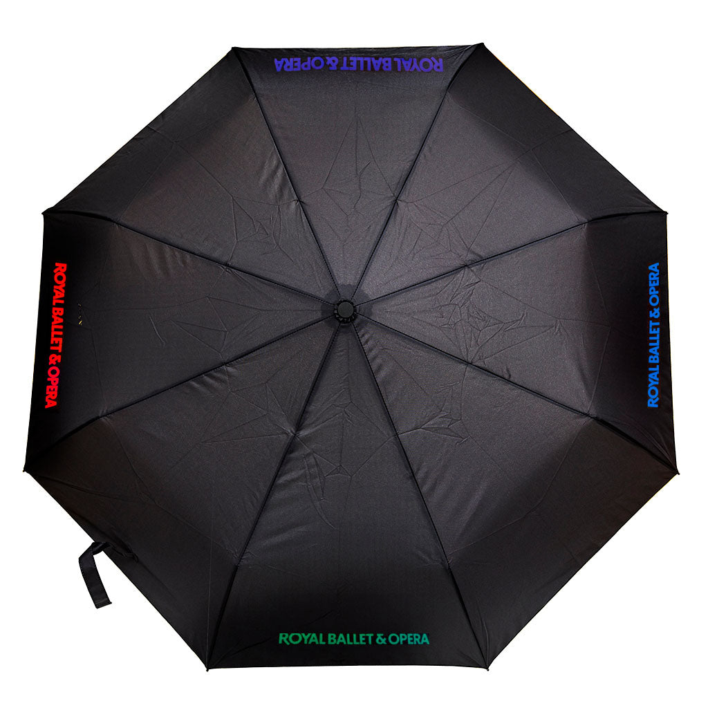 Black Umbrella with royal ballet &amp; opera in colourful text on four panels
