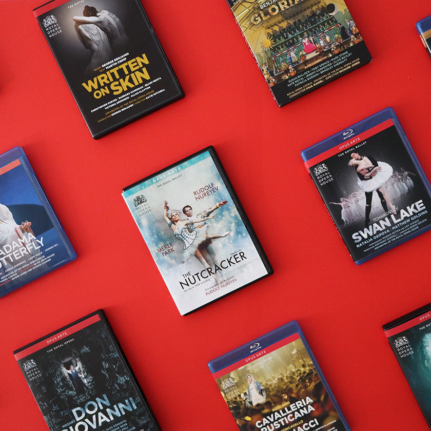 Collection of ballet and opera DVDs and Blurays on a red background