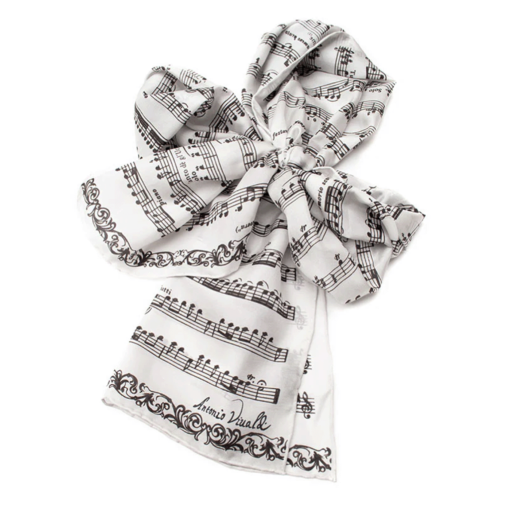 White scarf with black musical notes and text on a white background