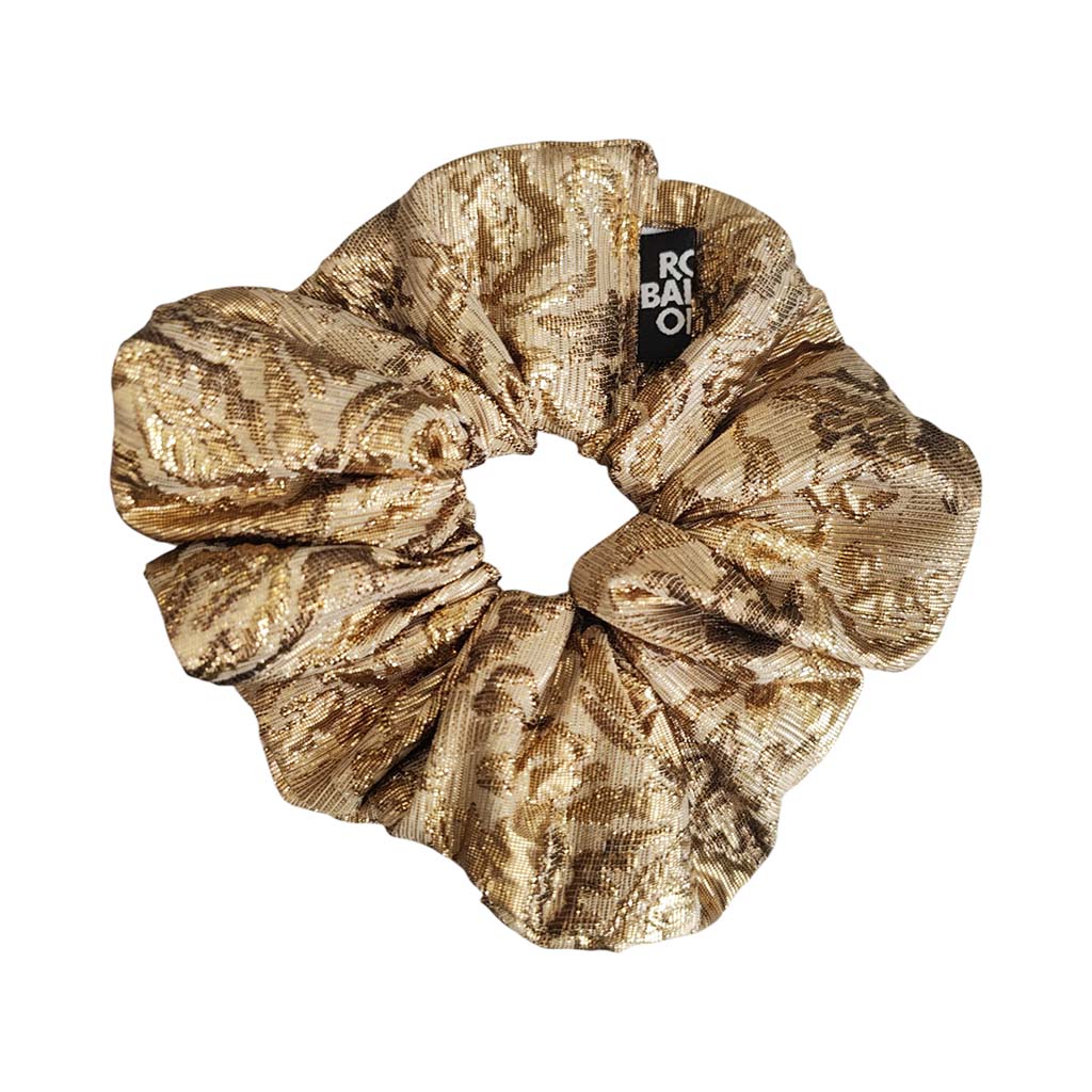 Hair scrunchie made from costume fabric in a bronze/gold floral pattern