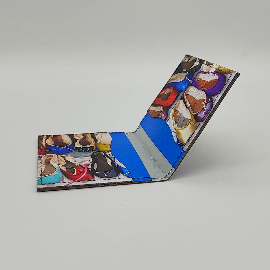 Cardholder with colourful ballet pointe shoe design on a gray background
