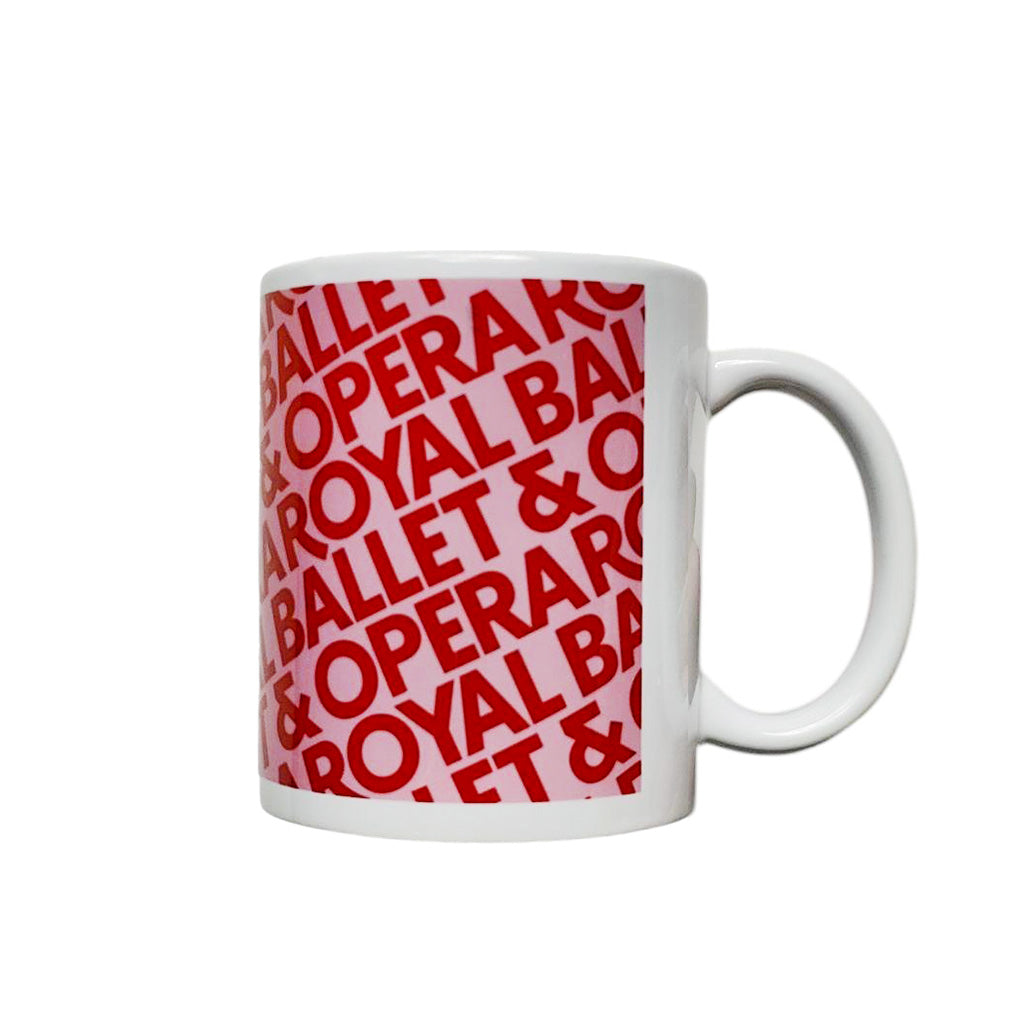 White mug with red &#39;Royal Ballet &amp; Opera&#39; text pattern on a white background