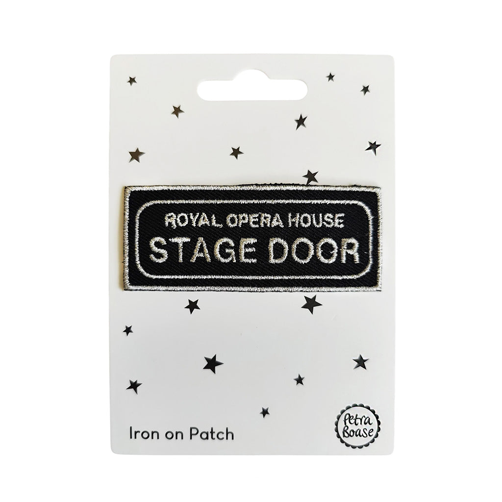Iron-on Patch with text Royal Opera House Stage Door on a backing card with stars on a white background
