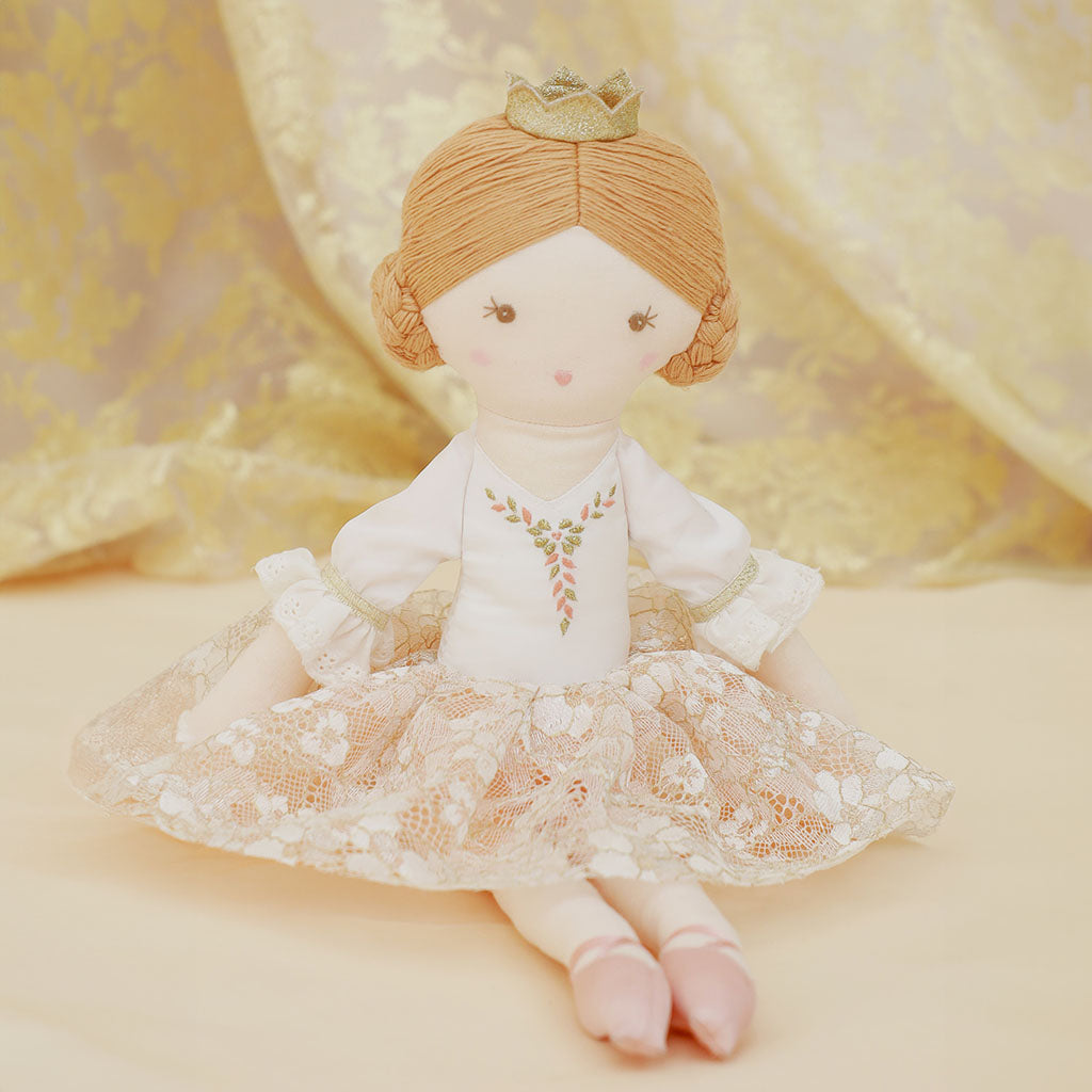Sugar Plum Fairy Doll with a white dress and lace skirt on a white background