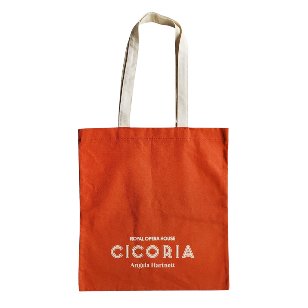 Burned orange tote bag with 'Royal Opera House, Cicoria, Angela Hartnett' branding with cream straps on a white background