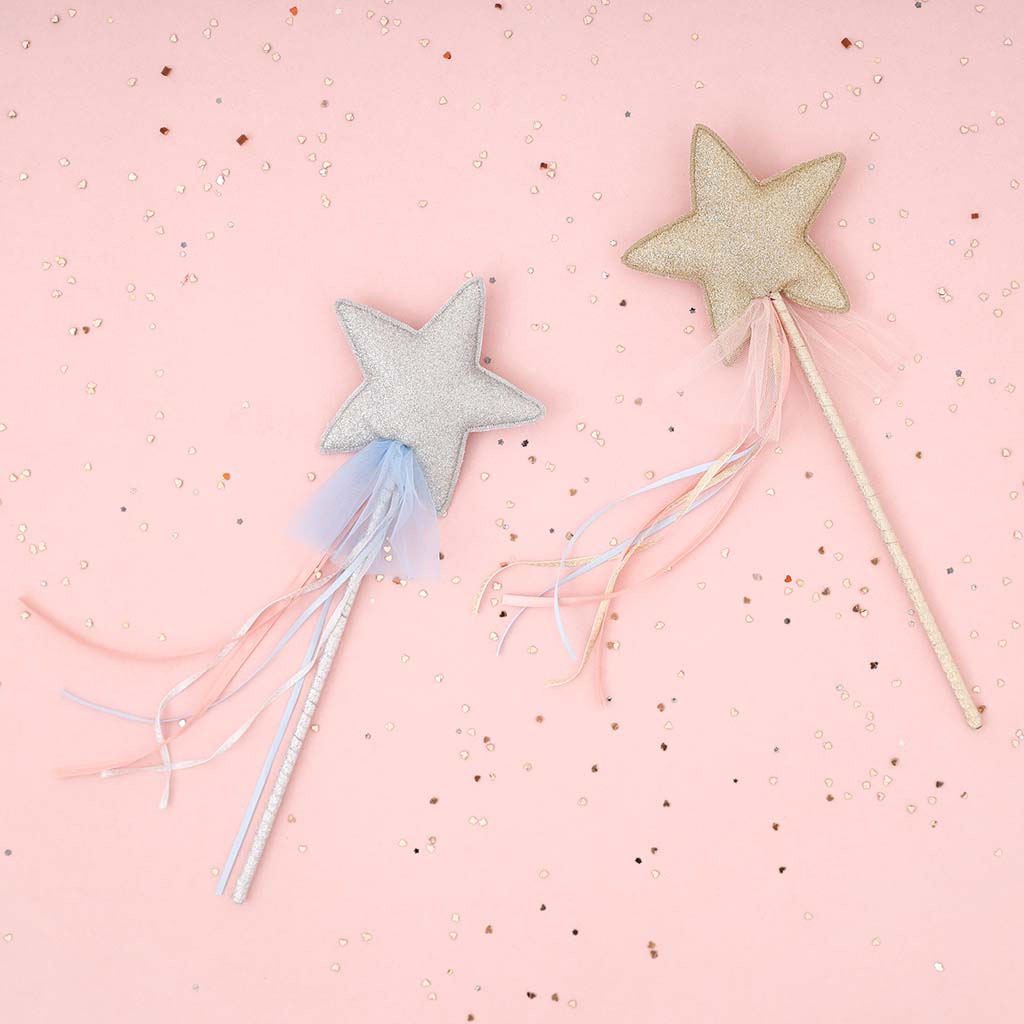 Silver and Gold Magic Wand with sparkly background