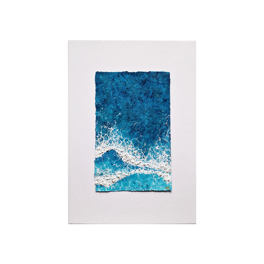 The Waves textured art piece in blue and white mounted on an A4 white board