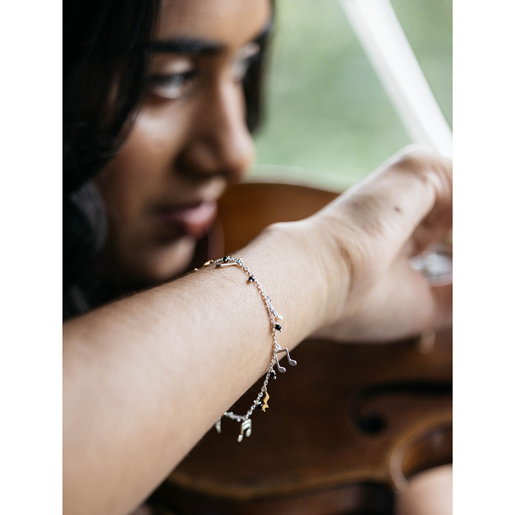 Musical Notes Charm Bracelet on violinist