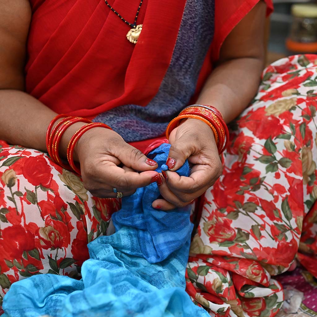 Artisan making Kantha jewellery