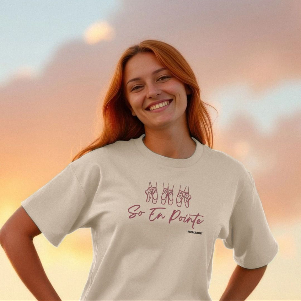 Pink  Printed T-shirt with pink text 'So en pointe' and black text 'Royal Ballet' on a white background